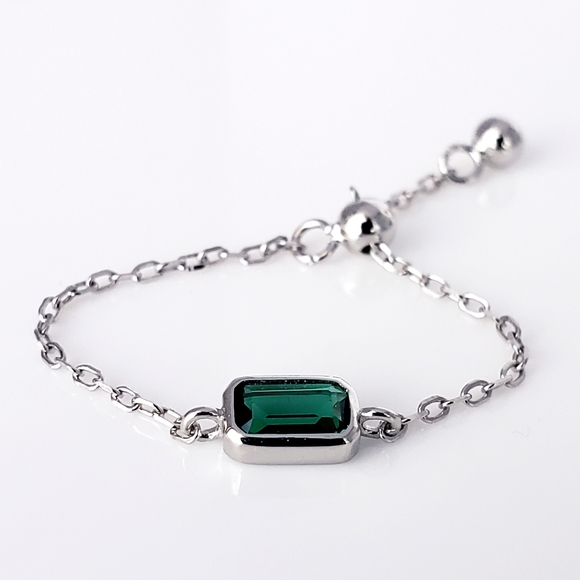 DANI•thegirl Jewelry - Dainty Sterling Silver Bezel Set Emerald Green CZ Stone Adjustable Chain Ring